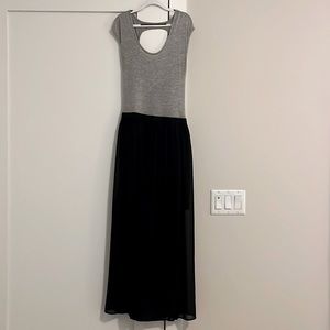 Jersey top dress with Sheer black maxi skirt with slit. Circle open back.